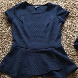 Blue peplum style top